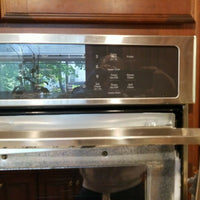 GE Profile 30"  Double Wall Oven Model #:PT9550SFSS FOR PARTS SHATTERED!!!