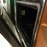 GE Profile 30"  Double Wall Oven Model #:PT9550SFSS FOR PARTS SHATTERED!!!