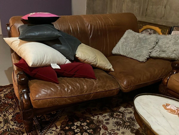 Pair Of Brown Leather Love Seats